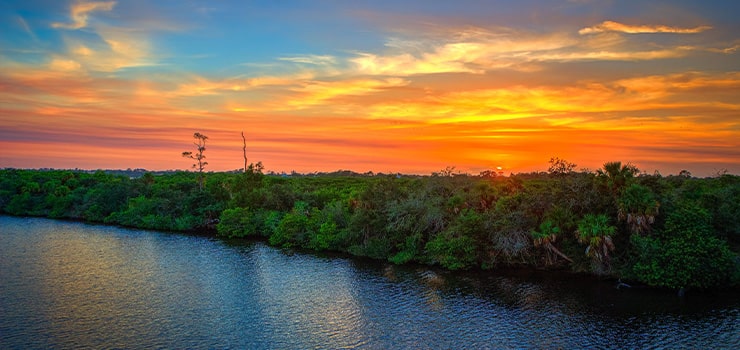 colorful skies over the st lucie river