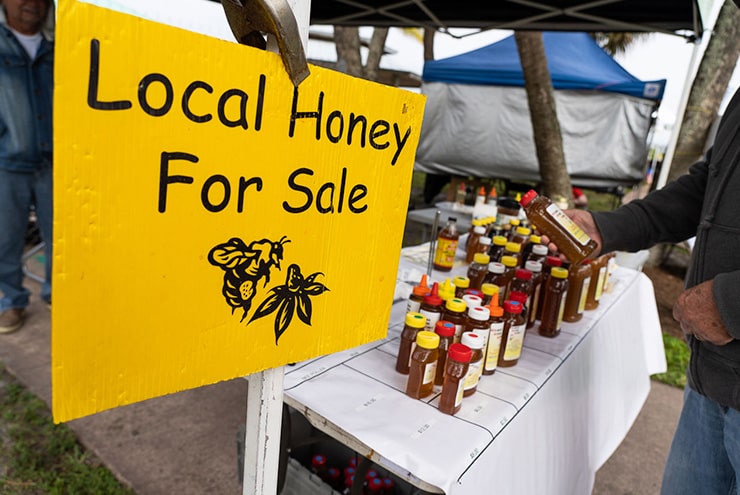 local honey sign at stuarts market on main Mart County Events