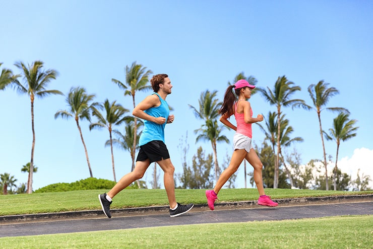 two people running on the treasure coast