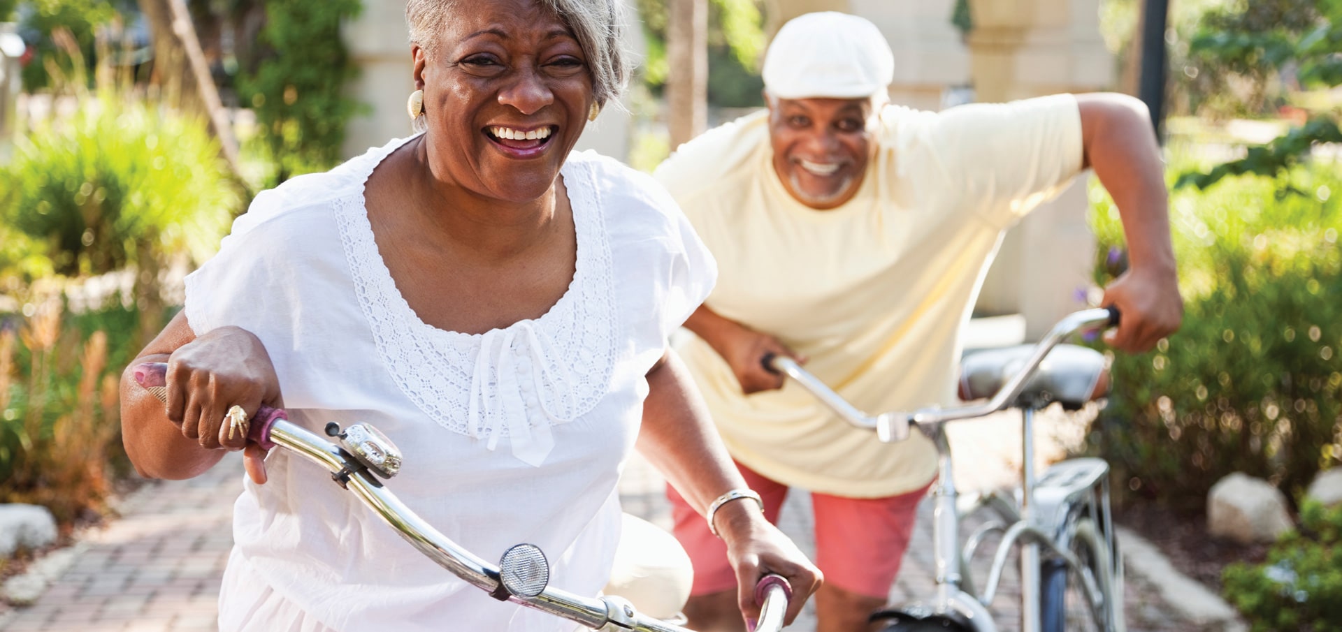 couple biking in community