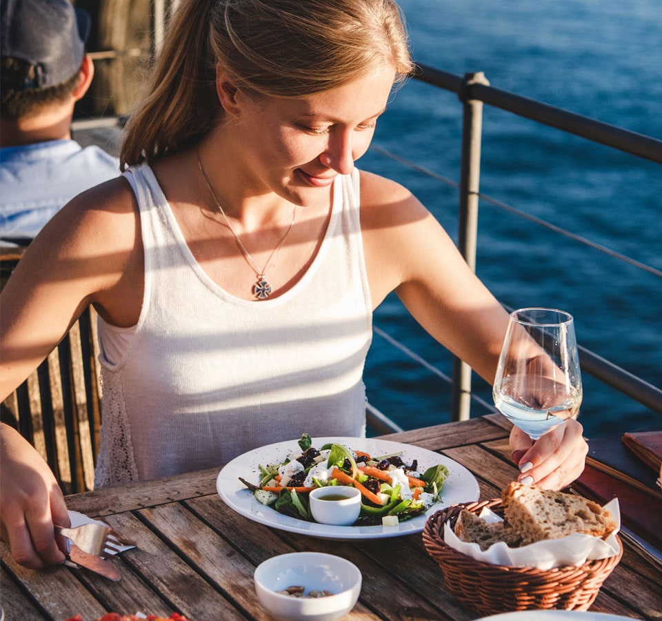 Woman enjoying Riverwalk Dining